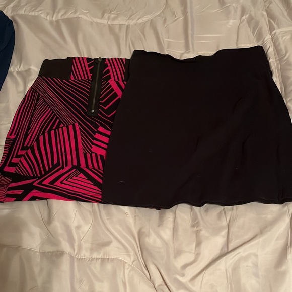 2 mini skirts *pink one is XS *black is L that fits as a M. - Picture 2 of 4